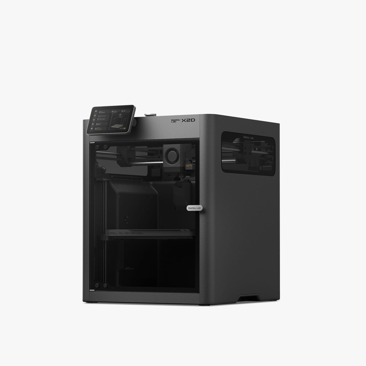 Bambu Lab X2D em vista três-quartos, câmara fechada em preto com porta de vidro